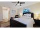 Bright bedroom with a padded headboard, ceiling fan, and a cozy, welcoming atmosphere at 138 69Th N Ave, St Petersburg, FL 33702
