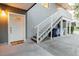 Inviting entrance with a front door with decorative glass, leading to an outdoor staircase and upper-level entrance at 138 69Th N Ave, St Petersburg, FL 33702