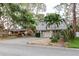 Inviting home with a spacious driveway, garage, and lush landscaping in a desirable neighborhood at 138 69Th N Ave, St Petersburg, FL 33702