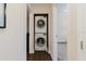 Interior laundry space with stacked washer and dryer units, maximizing space and convenience at 138 69Th N Ave, St Petersburg, FL 33702
