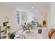 Bright living room featuring neutral paint, recessed lighting, and wood-look floors at 138 69Th N Ave, St Petersburg, FL 33702
