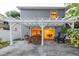 Spacious patio with pergola, featuring comfortable seating and seamless indoor-outdoor flow at 138 69Th N Ave, St Petersburg, FL 33702