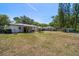 Spacious backyard with patio, playground and plenty of room to entertain or play at 14 S Meteor Ave, Clearwater, FL 33765