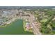 Expansive aerial view showcasing the community, waterfront homes and lush landscaping at 1405 W Del Webb Blvd, Sun City Center, FL 33573