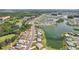 Beautiful aerial view showcasing waterfront homes and community amenities on a sunny day at 1405 W Del Webb Blvd, Sun City Center, FL 33573