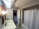 Bathroom featuring a vanity, toilet, and shower/tub combination with a shower curtain at 1654 S Lake Ave # 2, Clearwater, FL 33756
