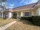 Charming one-story home featuring well-maintained landscaping and a welcoming front porch at 1654 S Lake Ave # 2, Clearwater, FL 33756