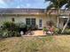 Private patio featuring a grill, potted plants, and outdoor seating at 1654 S Lake Ave # 2, Clearwater, FL 33756