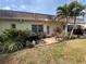 Cozy patio with grill and a small table, great for outdoor relaxation at 1654 S Lake Ave # 2, Clearwater, FL 33756