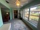Bright sun room with large window and closet, perfect for relaxing at 1654 S Lake Ave # 2, Clearwater, FL 33756