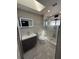 Modern bathroom with updated shower and fixtures at 1710 Tallowtree Cir, Valrico, FL 33594