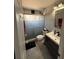 Modern bathroom features updated sink, toilet, and glass enclosed shower at 1710 Tallowtree Cir, Valrico, FL 33594