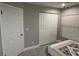 This bedroom features a window, closet and ceiling fan at 1710 Tallowtree Cir, Valrico, FL 33594