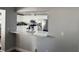 Eat-in kitchen bar with stylish stools and marble countertops at 1710 Tallowtree Cir, Valrico, FL 33594