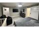 Spacious main bedroom with a modern design and sitting area at 1710 Tallowtree Cir, Valrico, FL 33594