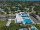 Aerial shot of the modern aquatic center with a pool, playground, and parking, near residential neighborhoods at 1727 New Hampshire Ne Ave, St Petersburg, FL 33703