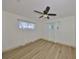 Empty bedroom with neutral tones, filled with ample natural light at 1727 New Hampshire Ne Ave, St Petersburg, FL 33703