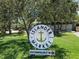 Signage for Islander Market, a neighborhood grocer, located at 4534 Chancellor St NE, surrounded by grassy landscaping at 1727 New Hampshire Ne Ave, St Petersburg, FL 33703