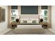 Cozy bedroom featuring a comfortable bed, neutral decor, and bedside tables with lamps at 1812 Tropical Oasis Ave, Plant City, FL 33565