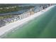 Gorgeous aerial view features oceanfront property and a serene shoreline at 18650 Gulf Blvd # 313, Indian Shores, FL 33785