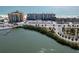 Panoramic aerial view of a waterfront condo community, showcasing its proximity to the beach and surrounding waterways at 18650 Gulf Blvd # 313, Indian Shores, FL 33785