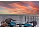 Enjoy breathtaking ocean views from this condo balcony with comfortable seating, perfect for relaxing and entertaining at 18650 Gulf Blvd # 313, Indian Shores, FL 33785