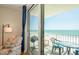 Comfortable balcony seating overlooking a stunning beach and ocean at 18650 Gulf Blvd # 313, Indian Shores, FL 33785