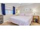 Comfortable bedroom with seahorse bedding, soft lighting, and coastal decorations create a serene and inviting space at 18650 Gulf Blvd # 313, Indian Shores, FL 33785