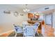 Bright dining area with a charming glass table and decorative nautical elements, perfect for seaside meals at 18650 Gulf Blvd # 313, Indian Shores, FL 33785