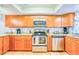 Fully equipped kitchen features stainless steel appliances, granite counters, and ample cabinet space at 18650 Gulf Blvd # 313, Indian Shores, FL 33785