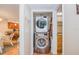 Laundry closet featuring stackable washer and dryer at 18650 Gulf Blvd # 313, Indian Shores, FL 33785