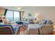Comfortable living room with stylish furniture and an ocean view at 18650 Gulf Blvd # 313, Indian Shores, FL 33785