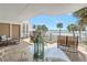 Spacious balcony with comfortable seating and ocean views at 19910 Gulf Boulevard # 102, Indian Shores, FL 33785
