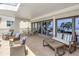 Expansive balcony with multiple seating areas and stunning ocean views at 19910 Gulf Boulevard # 102, Indian Shores, FL 33785