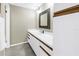 Bright bathroom with a white vanity, ample counter space, and wood-look accents at 19910 Gulf Boulevard # 102, Indian Shores, FL 33785