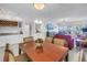 Inviting dining area with an open floor plan, wet bar and beautiful ocean view at 19910 Gulf Boulevard # 102, Indian Shores, FL 33785