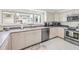 Bright kitchen featuring stainless steel appliances and ample counter space at 19910 Gulf Boulevard # 102, Indian Shores, FL 33785