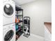 The laundry room features an updated washer and dryer at 19910 Gulf Boulevard # 102, Indian Shores, FL 33785