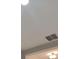 A well-lit ceiling shows a functional air vent and a recessed light fixture at 20092 Stone Pine Cir, Lutz, FL 33558