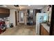 Functional garage area with laundry appliances, a utility sink, and ample storage solutions at 2035 Erin Dr, Holiday, FL 34690
