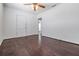 Bright living room boasts dark wood floors and a ceiling fan at 2111 W Grace St, Tampa, FL 33607