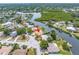 An aerial shot showcasing a waterfront home and canal access at 2146 Egret Drive, Clearwater, FL 33764