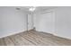 Bedroom boasts hardwood flooring and a spacious closet at 2146 Egret Drive, Clearwater, FL 33764