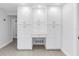 A spacious built-in storage unit with cabinets and a desk area, providing ample storage at 2146 Egret Drive, Clearwater, FL 33764