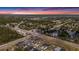 Aerial view of the community offering lush landscapes with a nearby ocean view at 2693 Leafwing Ct, Palm Harbor, FL 34683