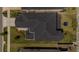 Aerial view of the home's roof and well-maintained yard within the surrounding neighborhood at 2693 Leafwing Ct, Palm Harbor, FL 34683