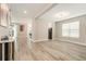 Bright open living room with contemporary design elements and plenty of natural light at 2693 Leafwing Ct, Palm Harbor, FL 34683