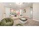 Spacious living area boasting modern furnishings, neutral tones, and ample natural light at 2693 Leafwing Ct, Palm Harbor, FL 34683
