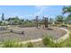 Community playground equipment includes a slide, climbing structure and bench seating at 2693 Leafwing Ct, Palm Harbor, FL 34683