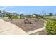 Community playground with climbing structure, slides, and bench seating is perfect for active play at 2693 Leafwing Ct, Palm Harbor, FL 34683